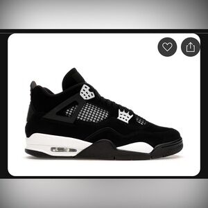 Jordan Men’s Black and White Air Retro Sneaker